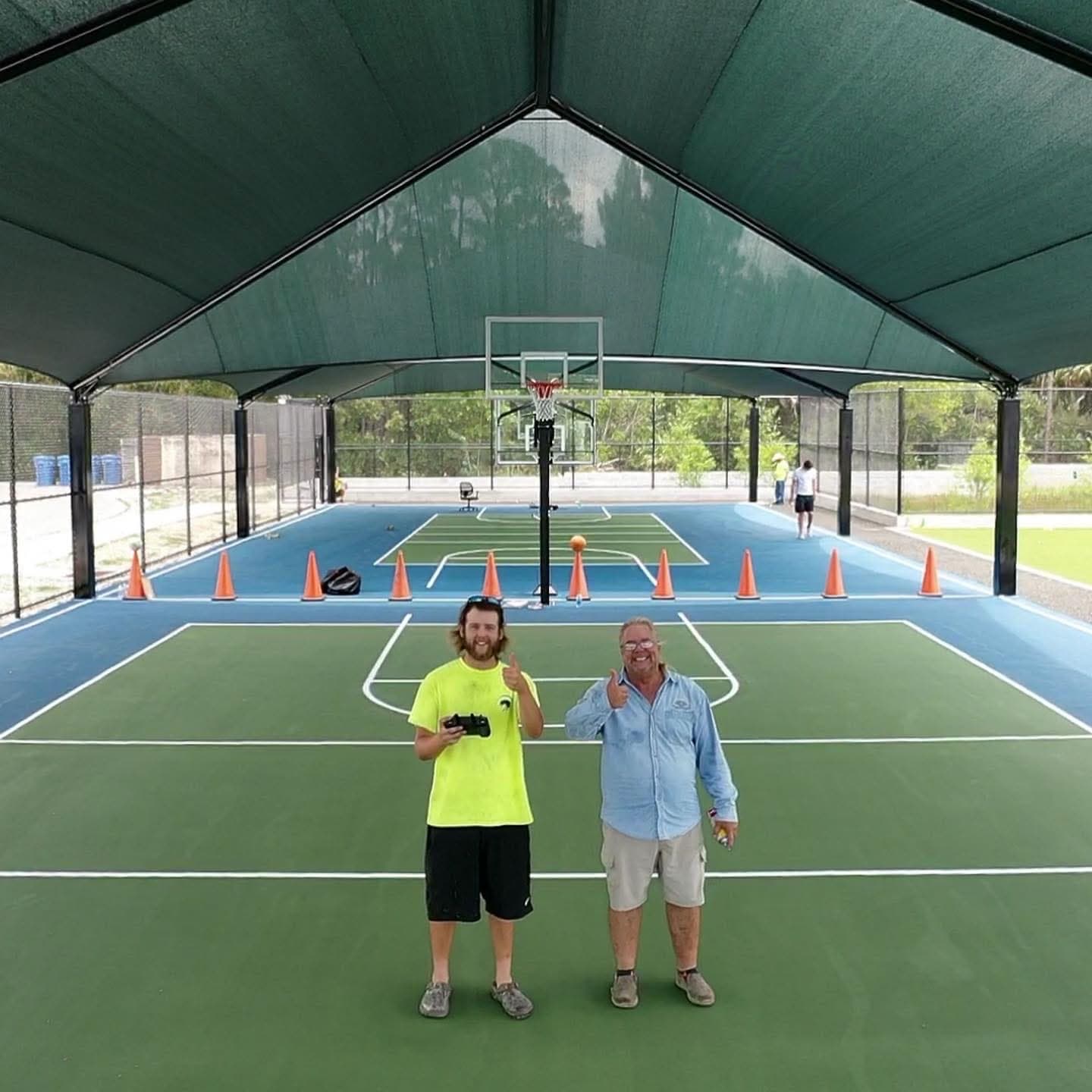 Large shade structure over full basketball court