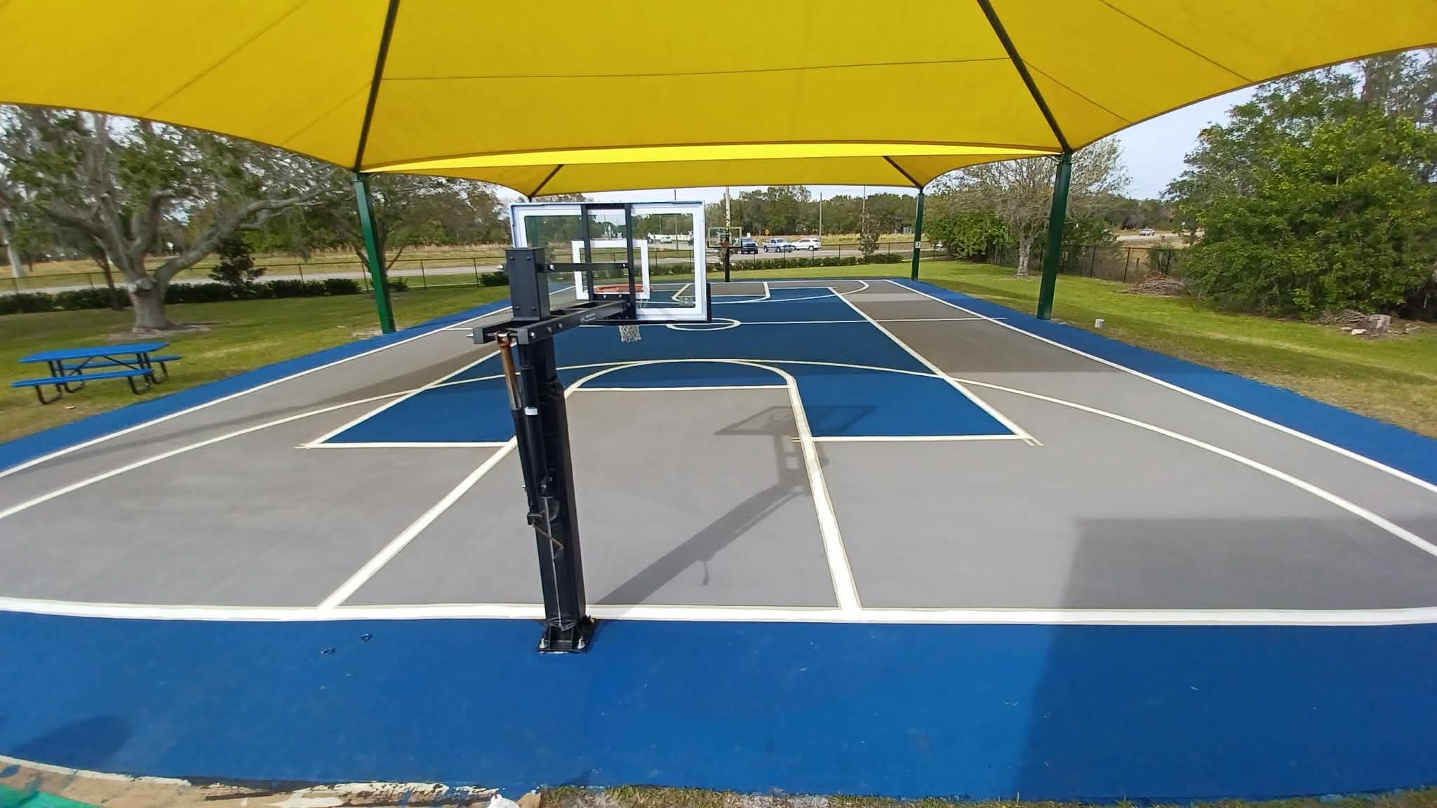 Sports court coating and shade structure at charter school