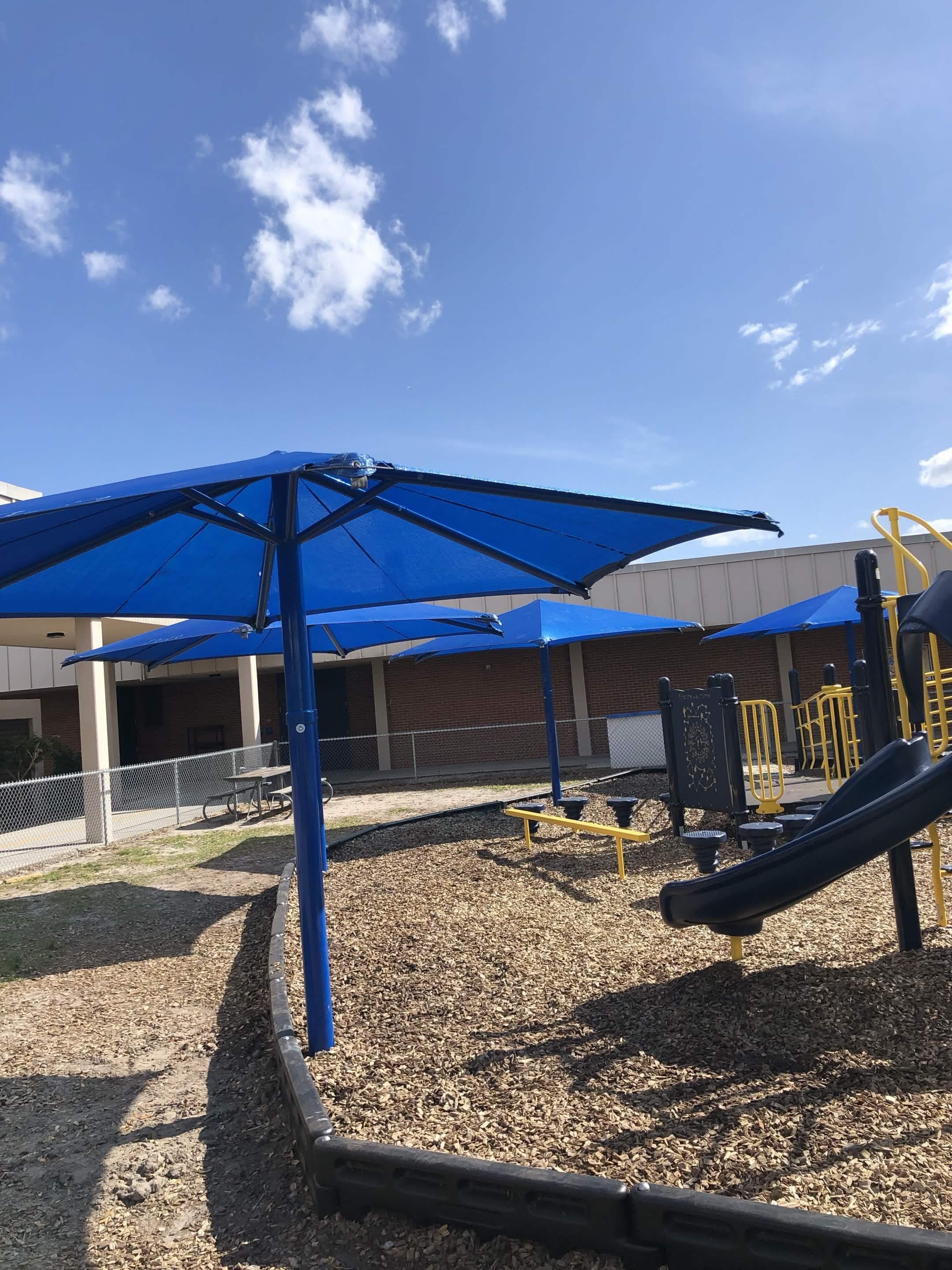 Single-post shade structures at school playground